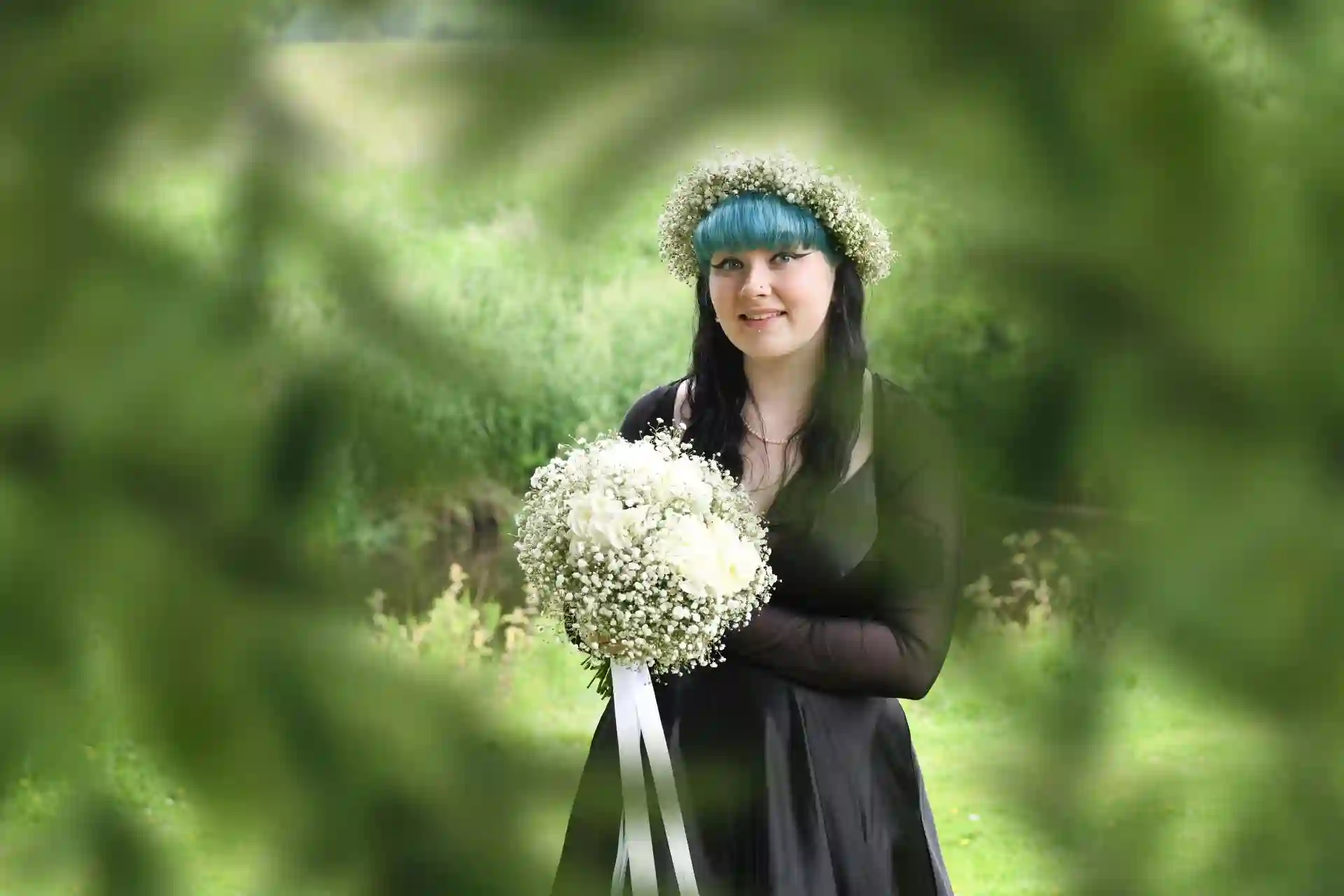 woman with flower in garden